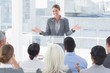 © WavebreakmediaMicro - Businesswoman doing speech during meeting