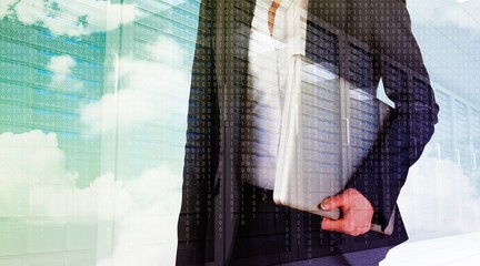 Aufkleber - Composite image of businesswoman holding laptop