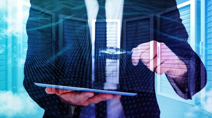 Poster - Composite image of businessman looking at his tablet