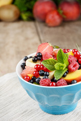 Wall Mural - Fresh tasty fruit salad