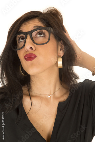 Fotografie, Obraz Funny expression woman puckered lips looking up wearing geek gla