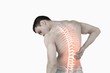 © WavebreakmediaMicro - Highlighted spine of man with back pain