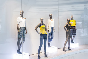 Wall Mural - Mannequins in fashion shopfront