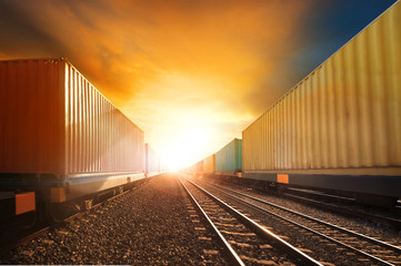 Wall Mural - industry container trainst running on railways track against bea