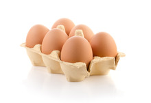 Six Brown Eggs In Carton On White With Clipping Path