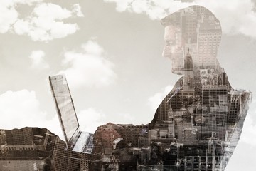 Aufkleber - Composite image of businessman using laptop