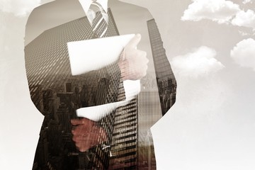 Aufkleber - Composite image of businessman holding his laptop tightly