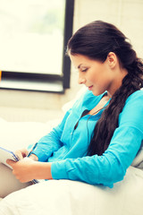 Wall Mural - calm woman with big notepad