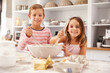 © Monkey Business - Two children having fun baking in the kitchen