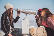 Girls Fooling Around With Panorama Binoculars Telescope