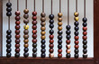 Antique abacus with painted wooden beads
