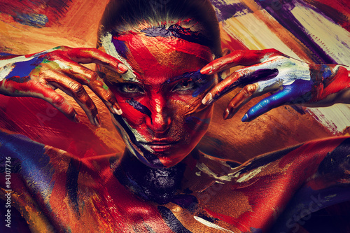 Fototapeta dla dzieci mysterious girl with paints on face