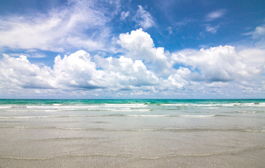 Wall Mural - sea and blue sky with clouds in sunny day
