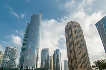 Tall skyscrapers in Dubai near water