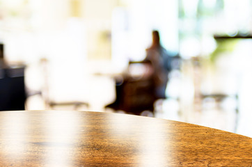 Poster - Empty round table top at coffee shop blurred background with bok