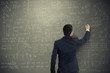 © ArtFamily - man writing formulas