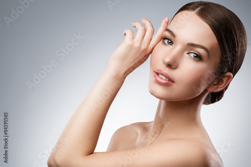 Fotografering Young woman with beautiful face and soft skin