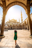 Fototapeta  - Woman near the Blue Mosque in Istanbul