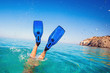 Flippers in water. Diver fins. Active vacation at sea. Diving.