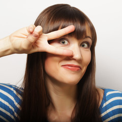 woman showing two fingers or victory gesture 