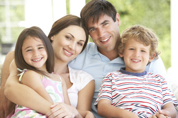 Wall Mural - Family Group Relaxing On Chair Together