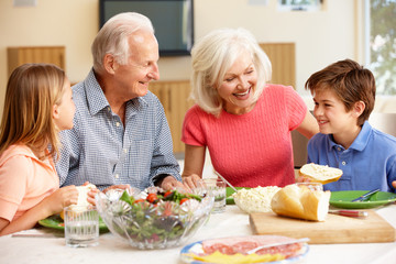 Wall Mural - Family sharing meal