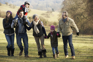 Wall Mural - 3 Generation family on country walk in winter