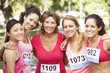 © Monkey Business - Group Of Female Athletes Competing In Charity Marathon Race