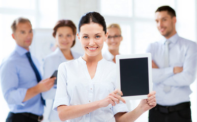 Canvas Print - businesswoman with tablet pc in office