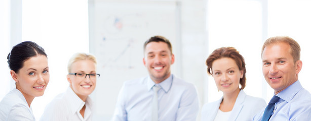 Poster - friendly business team in office