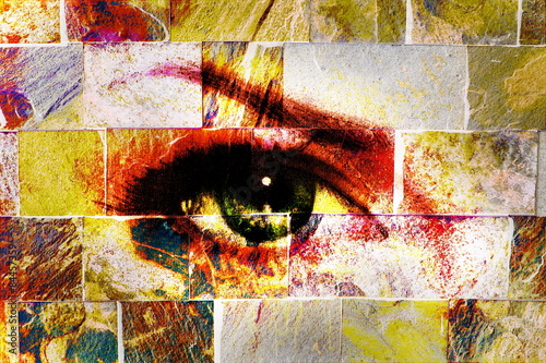 Fototapeta na wymiar woman eye, on wall structure background. brick painting concept