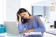© Monkey Business - Stressed Woman Working At Laptop In Home Office
