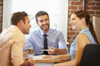 © Monkey Business - Couple Meeting With Financial Advisor In Office