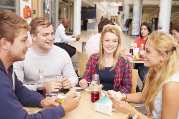 Group Of College Students Eating Lunch Together