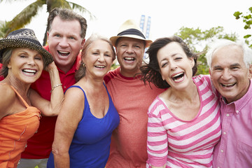 Portrait Of Senior Friends In Park Together