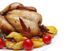  Toasted baked chicken with potato and tomatoes on a white background 