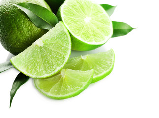 Canvas Print - Sliced fresh limes isolated on white