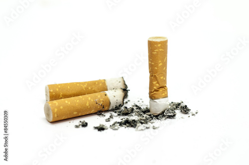 Fotografija Group of finished cigarettes isolated on white