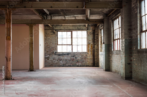 Naklejka na szybę Empty warehouse office or commercial area, industrial background