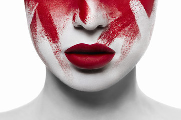 Fototapeta halloween bloody makeup. closeup red lips on white skin