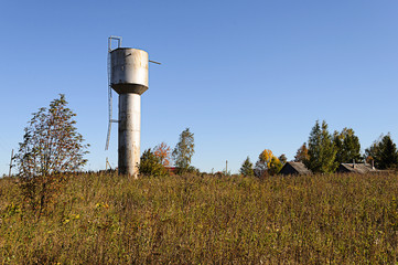 Old metal water tower in the village