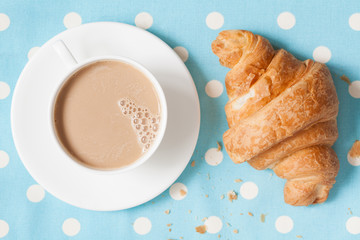 Wall Mural - cup of coffee latte and croisssant, traditional french