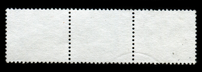 Reverse side of a postage stamp.