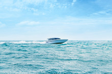 Big And Luxury Speedboat Moving In The Sea. Motor Vessel.