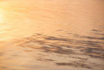 Wall Mural - water surface during sunset. natural seascape
