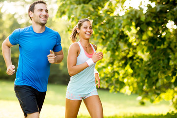 Young couple running