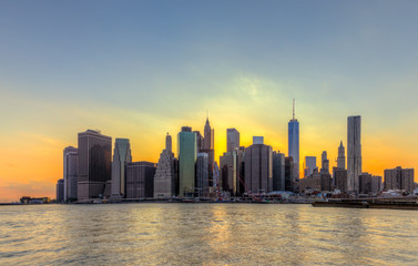 Fototapete - New York City Manhattan downtown skyline at sunset