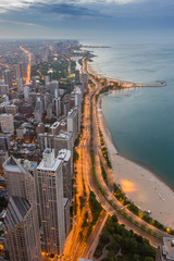 Fototapete - Chicago skyline and lake Michigan at sunset