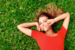 © yellowj - young woman in red dress lying on grass