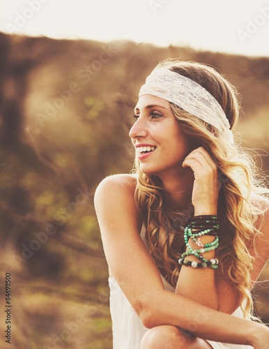 Fotografering Fashion Portrait of Beautiful Young Woman Backlit at Sunset